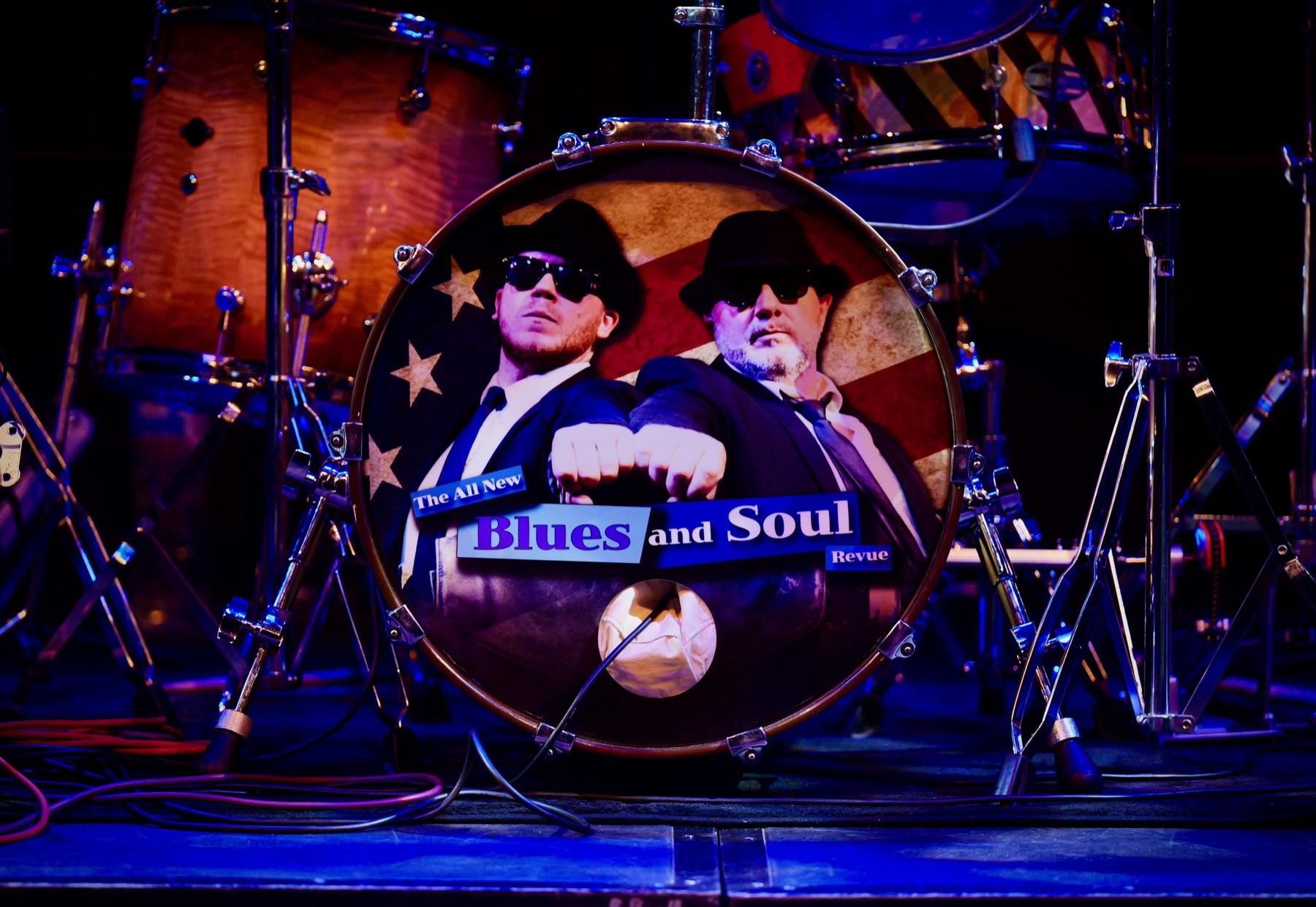 The band's branded bass drum on a live stage