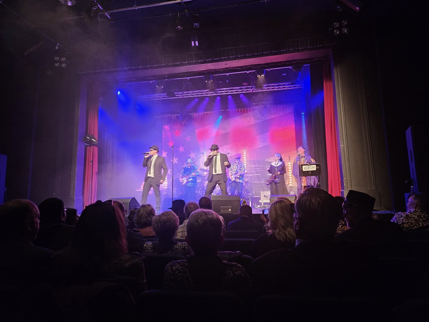 The All New Blues and Soul Revue performing to a seated theatre audience