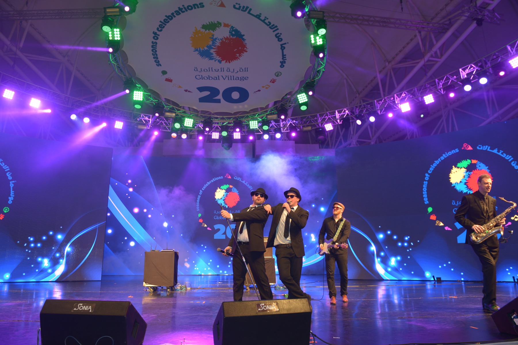 The All New Blues and Soul Revue performing beneath the Global Village stage canopy in Dubai