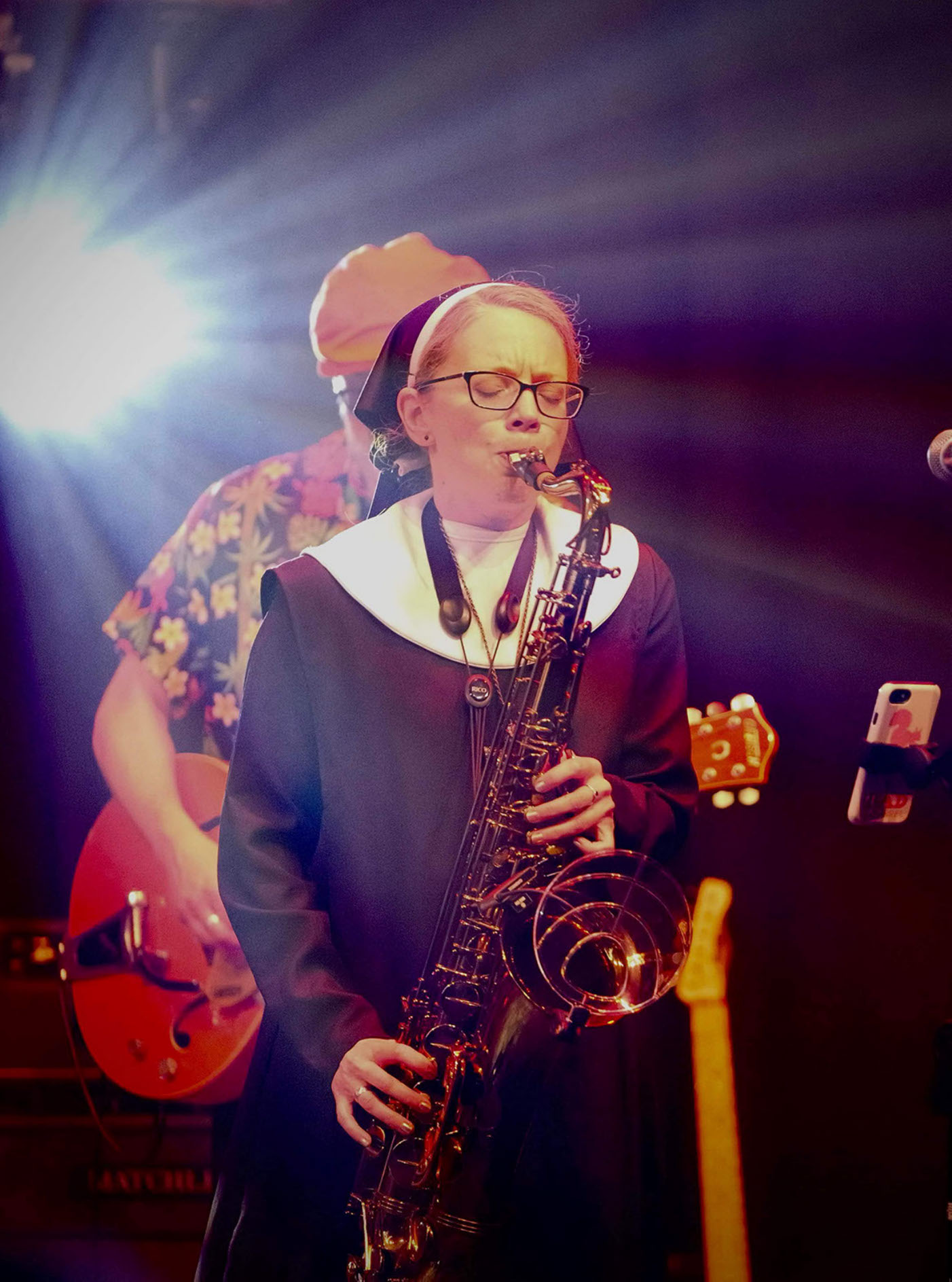 Sax player performing as The Penguin